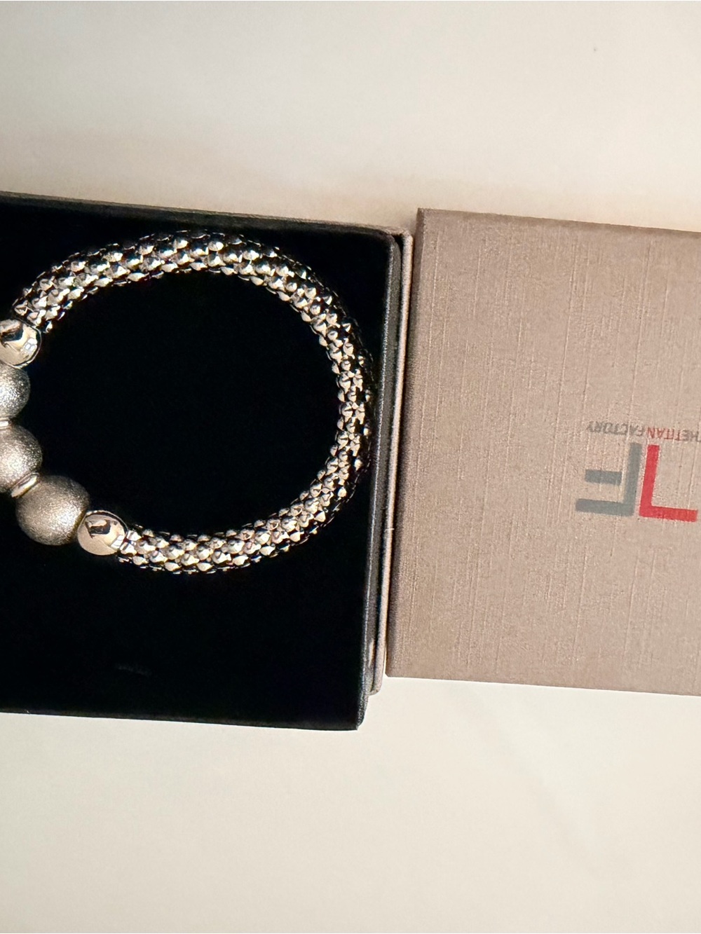 Men's silver Italian Factory bracelet w gift box.